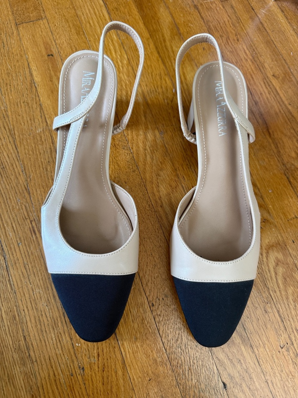 MiraAzzura Cream and Black Two-Tone Slingback Flats
